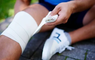Resize Close Up Sportsman With Knee Sprain