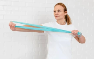 Resize Medium Shot Woman Holding Elastic Band