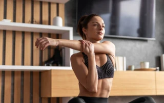 Resize Medium Shot Woman Stretching Her Arm