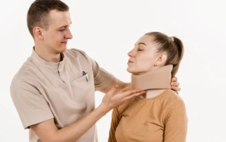 Resize Neurosurgeon Puts Cervical Soft Collar Neck Brace Bandage Young Woman Support Immobilize Neck Treat Traumatic Head Neck Injuries Cervical Collar