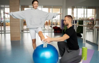 Resize Patient Doing Physical Rehabilitation Helped By Therapists 3
