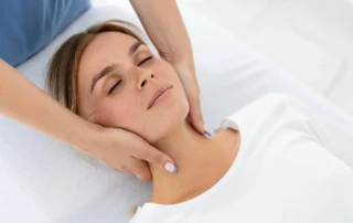 Resize Physiotherapist Helping Young Female Patient