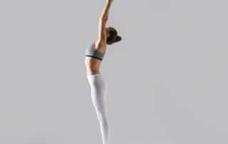 Resize Young Woman Tadasana Pose Grey Studio Background