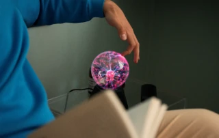Side View Man With Plasma Ball